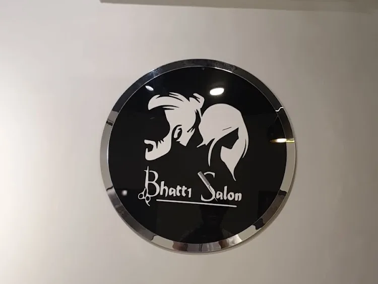 Bhatti Salon chrome wall seal